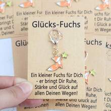 一套9件德国幸运狐狸钥匙扣套装，包含幸运故事卡，新年、乔迁、生日礼物、德国祝福、派对礼品、圣诞节生日礼物套装 - 橘色小狐狸 - 查看 3