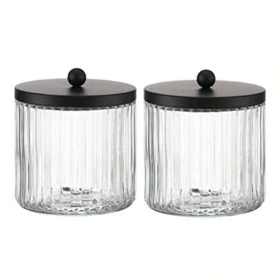 Juego de 2 dispensadores de botes de vidrio para hisopos - Organizador de almacenamiento de botes para el baño para bolas de algodón, hisopos, hilo dental y esponjas de maquillaje con tapa de metal negro mate - Frascos de boticario transparentes para el tocador