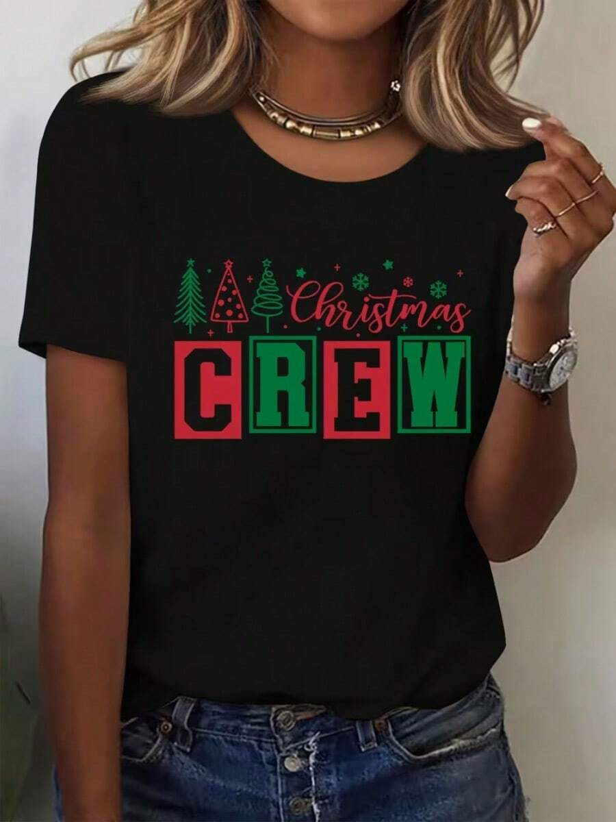 Camiseta informal de mujer con estampado de árbol de Navidad y copos de nieve. Cómoda camiseta de manga corta y cuello redondo, ideal para primavera y verano, fiestas navideñas y conjuntos de invierno; perfecta para cualquier ocasión. Color liso, estilo informal, ideal para fiestas navideñas, el Día de San Patricio, reuniones familiares y para el día a día. - Negro - Ver 1