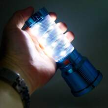 1个多功能汽车安全锥，带高亮手电筒，可用于户外自卫，太阳能供电，并可作为紧急警示灯使用。 - 彩色 - 查看 6