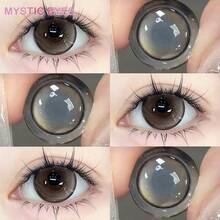 Mystic Eyes 1副棕色 0.00~6.00度数 14.5mm 年抛彩色隐形眼镜，含水量40%，温和，深邃放大双眼，佩戴舒适。 - 棕色 - 查看 2