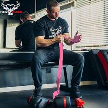 BEAST RAGE Vendas de boxeo para hombre, protección para MMA, soporte para guantes interiores, entrenamiento de artes marciales, Muay Thai, debajo de los mitones, vendas elásticas de 4,5 metros - Rosa - Ver 3