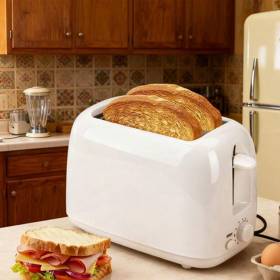 Tostadora de doble ranura ancha, con una ranura extra ancha que admite pan de corte grueso. Su diseño compacto y su exterior frío al tacto facilitan una limpieza sin esfuerzo. El calentamiento rápido y eficiente garantiza resultados perfectos para las necesidades del desayuno, lo que la convierte en la opción ideal para bagels, tostadas y sándwiches. - Blanco - Ver 1