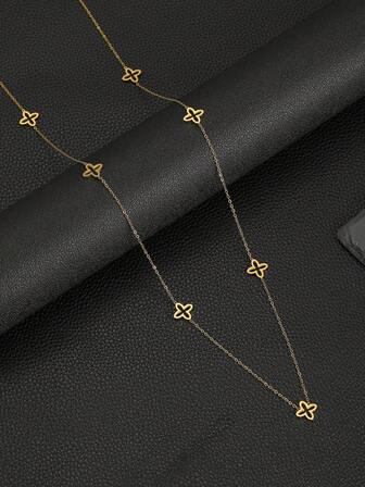 1 pieza Collar largo de flor de cuatro hojas hueca de oro de 18k, adecuado para uso diario casual de mujeres, accesorio de joyería de oro, cadena de suéter