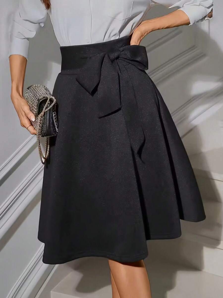 Elegant Women's Black A-Line Midi Skirt With Distinctive Bow Waist Detail, Made Of Non-Stretch Fabric For A Fitted Silhouette - Black - View 1