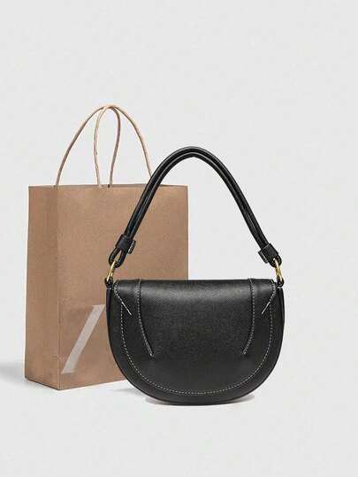 ZA新款秋季女士酒红色马鞍包，采用撞色缝线、顶部提手和翻盖斜挎硬质包袋设计。