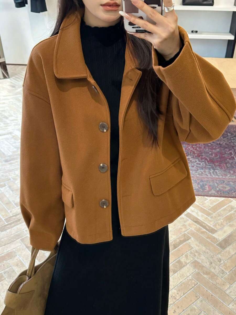 女士时尚简约办公/通勤外套，女士秋冬季休闲日常大衣，带前扣口袋，适合办公室、日常、旅行、机场等场合穿着。