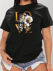 Camiseta Casual de Mujer con Estampado Floral y Hojas LOVE - Negra con Letras Doradas, Cuello Redondo Manga Corta, Tejido Elástico Medio, Lavable a Máquina para Primavera/Verano, Camisetas para Damas, Material No Transparente - Negro - Ver 1