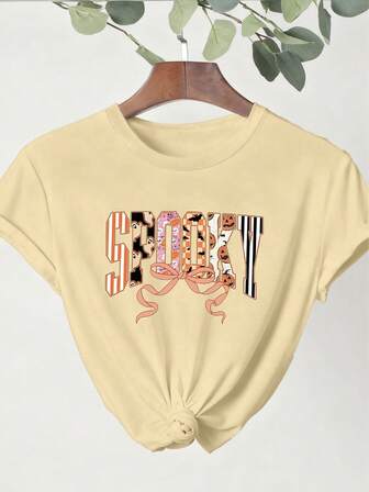 大码女式夏季南瓜、幽灵、蝙蝠、糖果字母图案和粉色蝴蝶结印花T恤，休闲舒适日常穿着度假风印花T恤