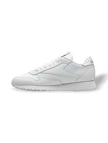 Reebok 经典真皮女款(GS)青少年运动鞋，吸汗透气保暖，百搭轻便，纯色Logo，易洗，弹性好，速干，适合运动户外跑步、上学、日常穿着，白色，货号100010471 - 白色 - 查看 1