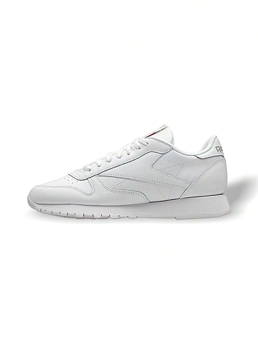 Reebok 经典真皮女款(GS)青少年运动鞋，吸汗透气保暖，百搭轻便，纯色Logo，易洗，弹性好，速干，适合运动户外跑步、上学、日常穿着，白色，货号100010471 - 白色 - 查看 1