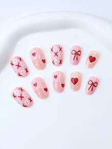 24片情人节美甲套装：椭圆形按压式美甲贴片，红粉爱心、网格、字母XO蝴蝶结图案，亚克力按压式美甲贴片，适合短指甲，亚克力美甲，红色美甲，粉色美甲，美甲装饰，适合女性约会、派对，提升个人魅力！美甲用品 - 紅色 - 查看 3