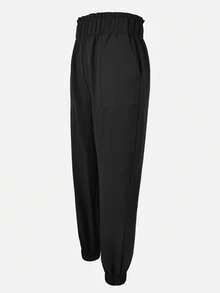 Pantalones casuales de mujer de unicolor con volantes en la cintura y bolsillos - Negro - Ver 6