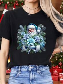 Camiseta informal de mujer con estampado de Papá Noel sosteniendo una rosa azul y una rama de pino. Cómoda camiseta de manga corta y cuello redondo, ideal para primavera y verano, fiestas navideñas y conjuntos de invierno; perfecta para cualquier ocasión. Color liso, estilo informal, ideal para fiestas navideñas, el Día de San Patricio, reuniones familiares y para el día a día. - Negro - Ver 1