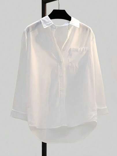 女士涤纶长袖衬衫，不对称下摆，前短后长设计，前口袋纽扣细节，休闲简约常规版型上衣