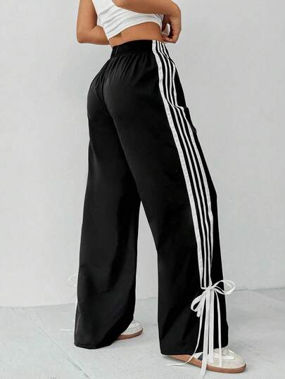 بنطلون نسائي بخصر مطاطي مع شريط أبيض على الجانب