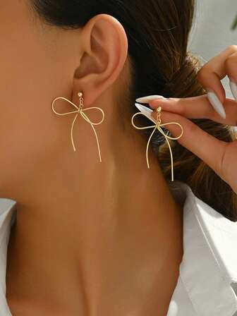 1 par de pendientes elegantes, de moda, minimalistas y creativos con lazo, adecuados para uso diario de mujeres