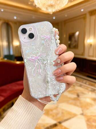 蝴蝶结手机壳 + 珍珠蝴蝶结手链挂绳，适用于苹果 17、17 Pro、17 Pro Max、16 Pro Max、16 Pro、16、11、12、13、14、15、12 Pro Max、13 Pro Max、14 Pro Max、15 Pro Max，苹果手机保护壳