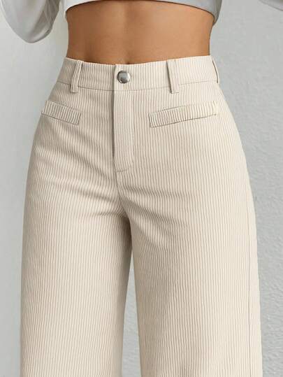 1 条纯色涤纶纽扣口袋拉链裤，适合春秋冬日常穿着