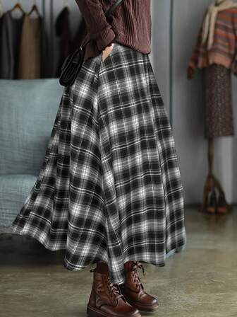 Falda plisada de cuadros retro nueva para el Día de San Valentín, primavera y verano. Falda acampanada de cintura alta en color marrón. Falda de longitud media con estilo forestal, versátil, de ajuste ceñido y que cubre las caderas. Con un diseño de cuadros vintage, es transpirable y agradable para la piel, manteniendo su forma. Adecuada para el trabajo y el uso diario, es una pieza versátil que eleva la calidad de tu armario de primavera y verano.
