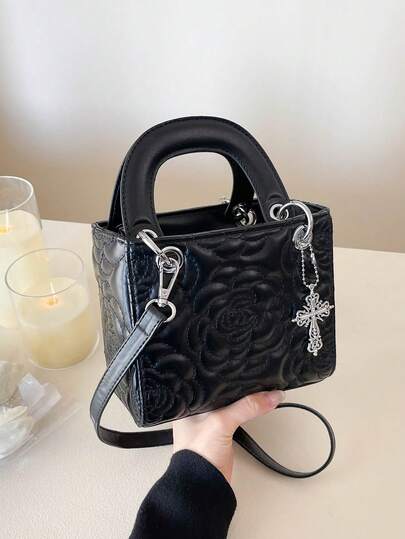 1个黑色PU材质优雅简约花卉绗缝精致五金配件可拆卸手柄顺滑拉链轻便斜挎手提包，适合女性工作、日常生活、通勤、社交聚会、商务、购物等场合，可装手机、钱包、口红、钥匙、纸巾、小袋等，时尚百搭。