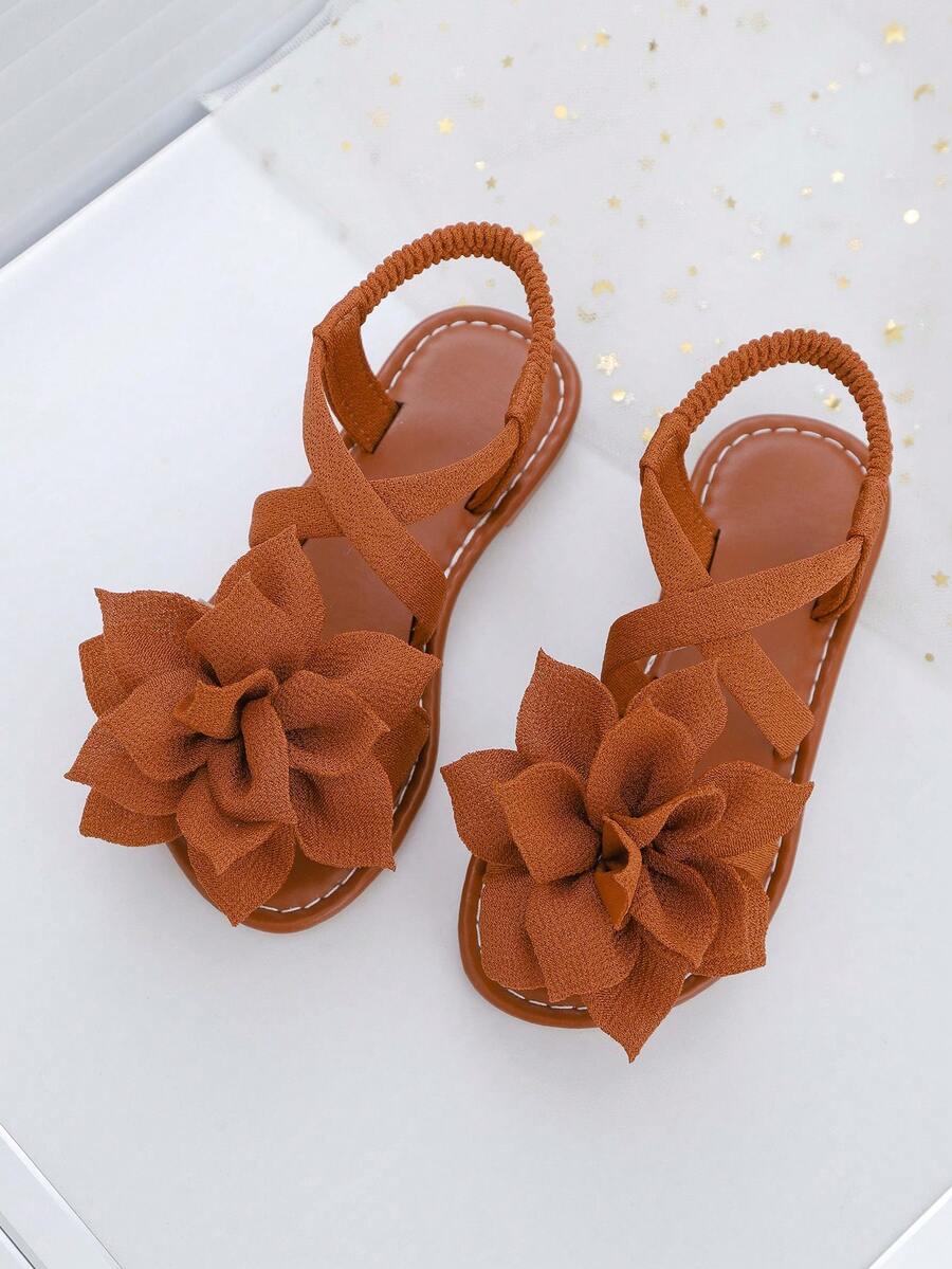 1 Paio di Sandali Piatti Marroni con Cinturini Floreali, Minimalisti con Cinturino Incrociato alla Caviglia, Punta Tonda con Suola Morbida, Sandali Casual Chic alla Romana, Adatti per Ragazze e Donne di Età Compresa tra 5-15 Anni, per Uso Quotidiano, Vacanze, Feste, Nuovi Arrivi Primavera/Estate 2026 - Castano - Visualizzare 1