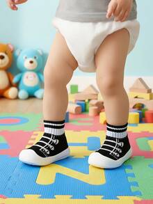 أحذية مشي أطفال رضع وأطفال صغار، أحذية مطاطية ناعمة مزينة بنمط شريط ربط مزيف، مضادة للانزلاق، مناسبة للداخل والخارج في فصلي الربيع والخريف، للأولاد والبنات - الأسود - مشاهدة 5