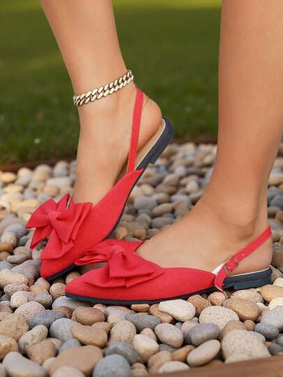 女士尖头平底鞋，优雅平底鞋，后跟带扣设计，蝴蝶结装饰，大码可选，舒适防滑，适合室内外场合穿着。