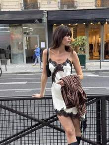 山茶花新款夏季女装时尚性感不对称蕾丝连衣裙，欧美风格优雅 - 白拼黑 - 查看 5