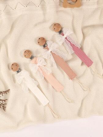 4个奶嘴夹，时尚蝴蝶结奶嘴链，颜色包括粉色、紫色、棕色、杏色、碎花和纯色，适合男孩女孩日常使用、旅行和居家使用。