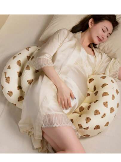 Denna gravidkudde ger stöd för ryggen, är bekväm för att sova på sidan och har en mjuk U-formad design som vaggar magen, vilket gör den till ett utmärkt presentval.