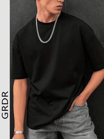 T-shirt ample à manches courtes pour hommes Design exquis Indispensable pour l'été Facile à assortir Mettez votre style en valeur