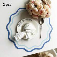 直径34厘米的花朵造型餐垫，约120克，多种颜色可选，适用于餐桌、茶几、书桌和吧台，防水、耐热、易清洁、可重复使用。 - 彩色 - 查看 19