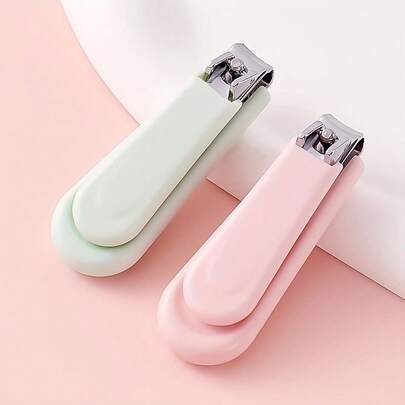 马卡龙色可爱指甲钳，圆形柔软防滑手柄，儿童专业修甲工具，实用便携，适合居家使用，老少皆宜，价格实惠，可用于修剪脚趾甲、指甲等，是指甲护理的理想之选，也是旅行、节日、节日、婚礼、情人节的完美礼物。