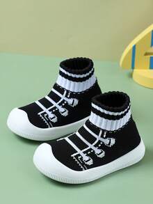 أحذية مشي أطفال رضع وأطفال صغار، أحذية مطاطية ناعمة مزينة بنمط شريط ربط مزيف، مضادة للانزلاق، مناسبة للداخل والخارج في فصلي الربيع والخريف، للأولاد والبنات - الأسود - مشاهدة 10