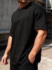 1 Stück Herren T-Shirt in Schwarz, weicher Rundhalsausschnitt, Kurzarm mit überschnittenen Schultern, lässiger sportlicher Stil, maschinenwaschbar - Schwarz - Übersicht 6