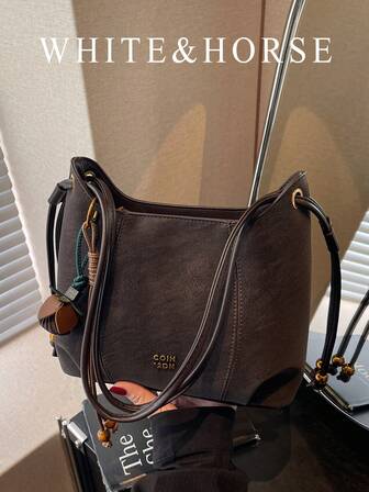 时尚优雅单肩斜挎包，精致通勤高端水桶包，女士冬季款