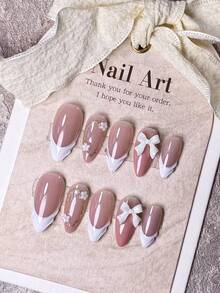 10 Pieces Of Handcrafted Press On Nails Stiletto, Press On Short Nails, Almond Nails, Hand-Pulled Gel With Hand-Painted Golden Glitter Coils, White Small Flower Ornaments And White Bow Decorations On Nude Pink Nail Surface;The Cute Nails Are Suitable For Ladies And Girls To Wear To Parties And Daily Use As Fall Press On Nails.