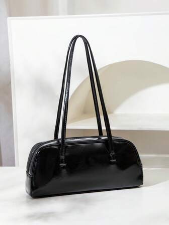 Avslappnad minimalistisk axelväska för kvinnor, enfärgat glansigt läder, exklusiv sminkväska, pendlarväska