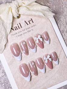 10 Pieces Of Handcrafted Press On Nails Stiletto, Press On Short Nails, Almond Nails, Hand-Pulled Gel With Hand-Painted Golden Glitter Coils, White Small Flower Ornaments And White Bow Decorations On Nude Pink Nail Surface;The Cute Nails Are Suitable For Ladies And Girls To Wear To Parties And Daily Use As Fall Press On Nails.