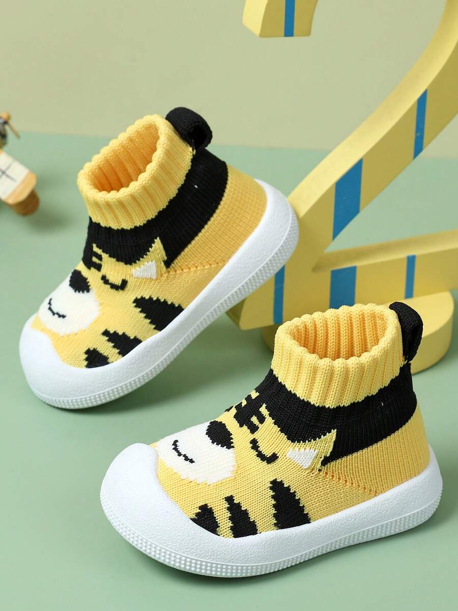 أحذية جوارب للمشي الأولى للرضع والأطفال الصغار، بتصميم كرتوني لطيف على شكل نمر، مصنوعة من الأكريليك المضاد للانزلاق وذات نعل ناعم، سهلة الارتداء، مناسبة للأولاد والبنات للاستخدام الداخلي والخارجي في الربيع والخريف - أصفر - مشاهدة 1