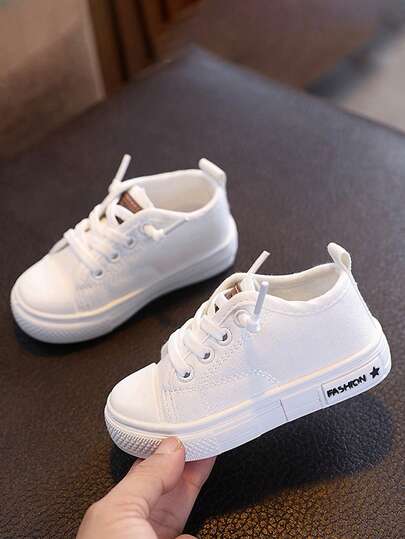 1 par de zapatillas de bebé, nuevas zapatillas de lona blancas casuales y transpirables con suela blanda antideslizante para niños pequeños, de moda para primavera/otoño