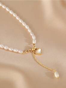 1件高品质铜珠金色心形吊坠串珠项链，适合女性日常、休闲、派对佩戴，也是秋冬季女士珠宝配饰、圣诞礼物、情人节礼物、送给女朋友的礼物、送给妈妈的礼物。 - 白色 - 查看 2
