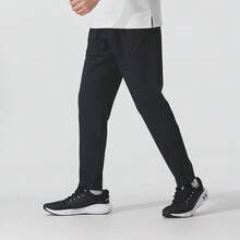 Under Armour OUTRUN THE STORM PANTS Slim-Fit Woven Trousers, Exercise Training & Casual Daily Sports - Black - View 1