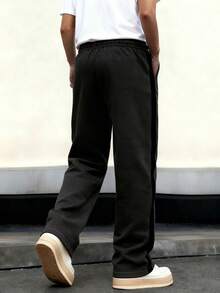 Calça de moletom masculina folgada, modelo reto e casual, ideal para o dia a dia, treinos esportivos, corrida, atividades ao ar livre, fitness, caminhada, streetwear, lazer e para o outono/inverno.