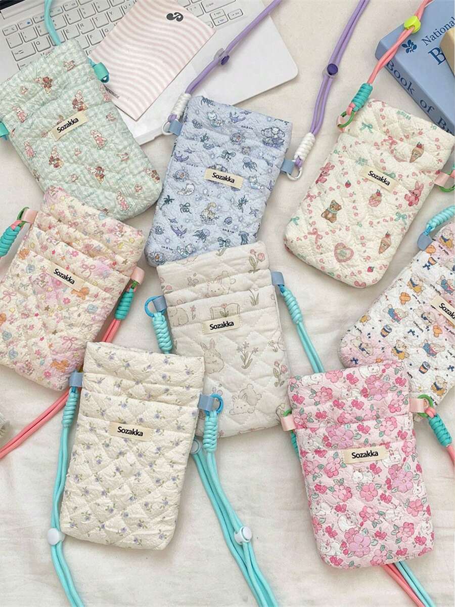 1个可爱卡通图案手机收纳包，手机钱包，斜挎包，女士轻便多功能收纳包，可装手机、耳机、充电器、口红、护手霜、防晒霜、零钱、首饰、卫生巾、硬币、小物件等，可作小型化妆包、唇油收纳包、卫生棉条收纳袋、打包袋等，女士旅行必备、邮轮必备、购物必备，生日礼物、新年礼物