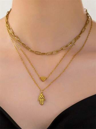 Set de 3 collares con colgante de acero inoxidable dorado con diseño hueco de palma y corazón. Es un accesorio de moda elegante y sencillo para mujeres. Incluye una cadena ajustable para un mejor ajuste alrededor del cuello, y es adecuado como regalo para novias, esposas, madres, familiares o amigos. Es un regalo perfecto para cumpleaños, sorpresa, aniversario o Día de San Valentín.