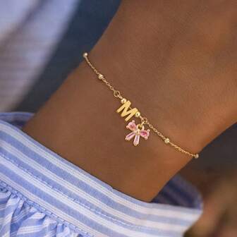 1 pieza Nuevo brazalete de cadena con cuentas de color dorado con lazo inicial para mujeres