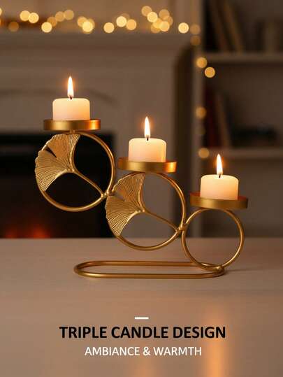 这款奢华镀金三烛台套装包含1个烛台，采用金色金属饰面，搭配艺术感十足的银杏叶图案，坚固耐用，可同时放置香薰蜡烛或圣诞主题蜡烛。非常适合客厅装饰、卧室点缀或婚礼装饰。也是理想的圣诞礼物、毕业礼物、送给闺蜜的礼物和冬季礼物。