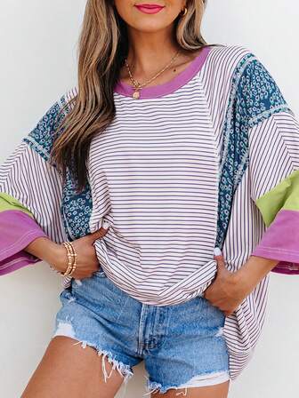 Blusa con mangas de pulsera, patchwork de bloques de color con estampado floral y rayas púrpuras, con borde crudo